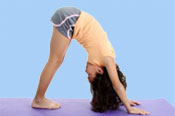Child practicing during a Yoga exercise.